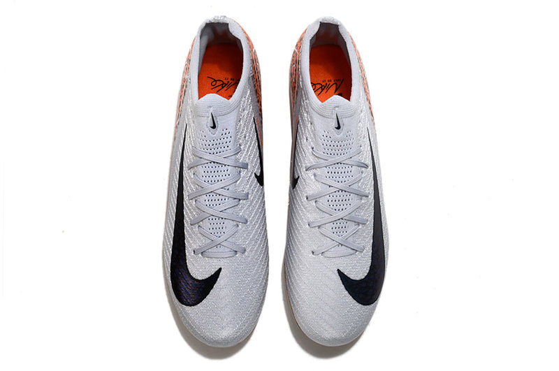 CHUTEIRA NIKE MERCURIAL VAPOR SAFARI 16 FG ELITE